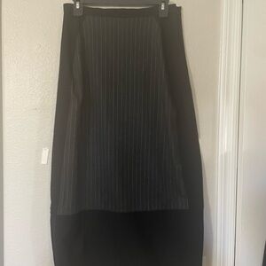 Charcoal gray pinstripe pencil skirt maxi with black side panels and border.
